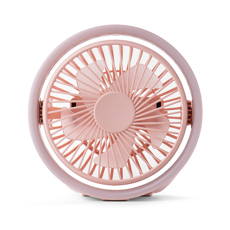 Pink portable fan on a white background